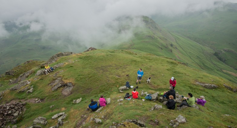 Reading poetry on Helm Crag