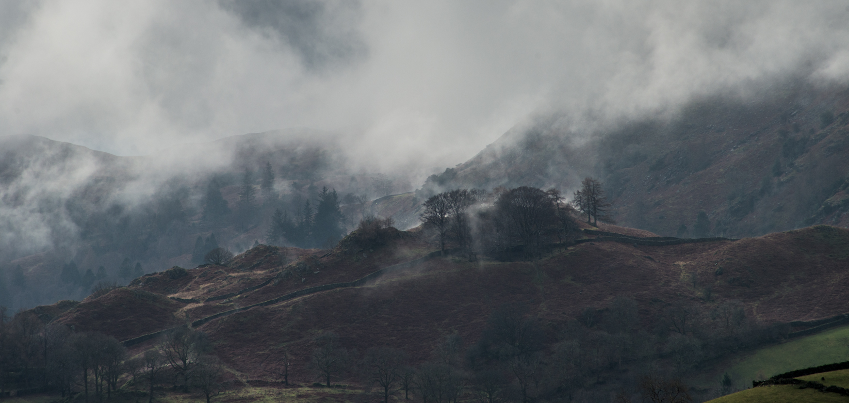 Clouds rising above the hills to the east of Grasmere.