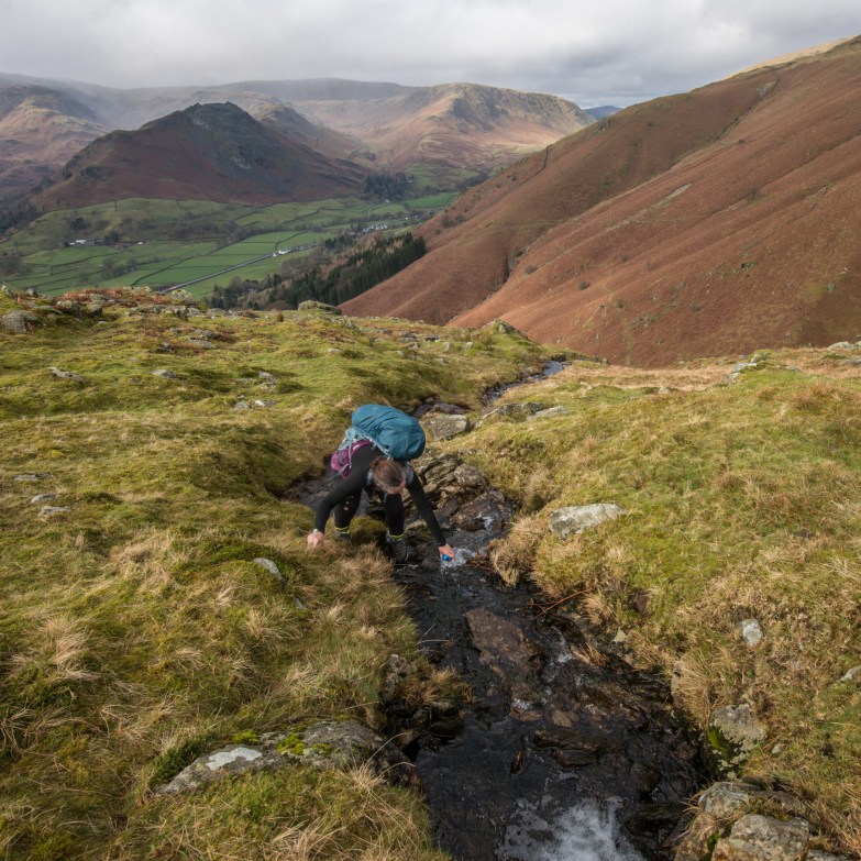 Filling our water bottle near Allcock Tarn.
