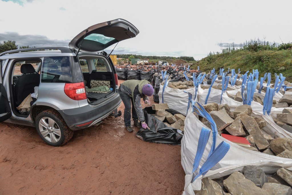 collecting stones from the quarry to be carved by Pip Hall