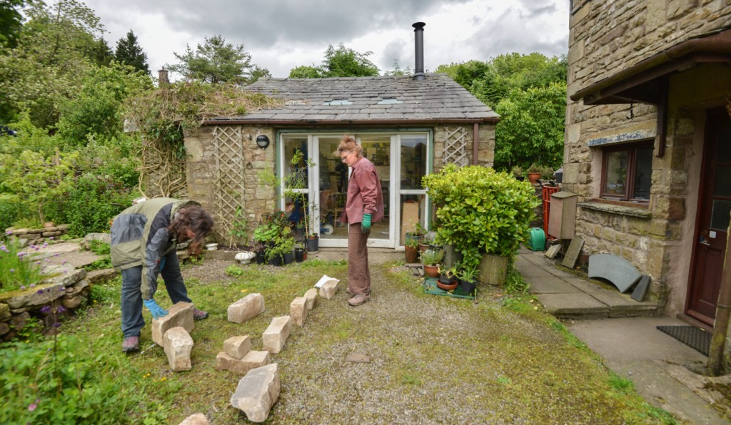 Sorting the stones with carver Pip Hall
