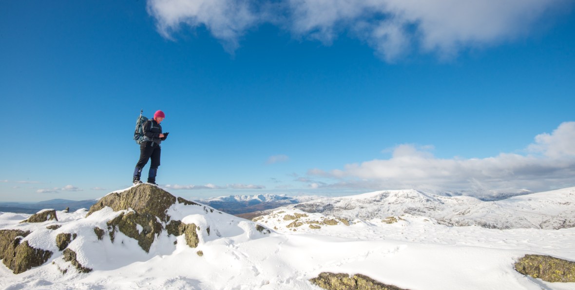 Harriet making notes on Yoke with the Scafell massif in the distance.